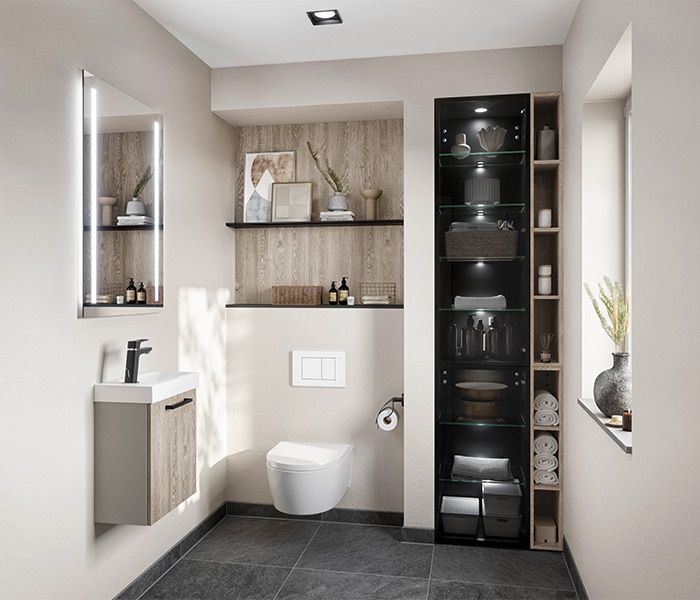 Badezimmer mit Einbauschrank Ein Badezimmer mit dunklen Einbauschrank