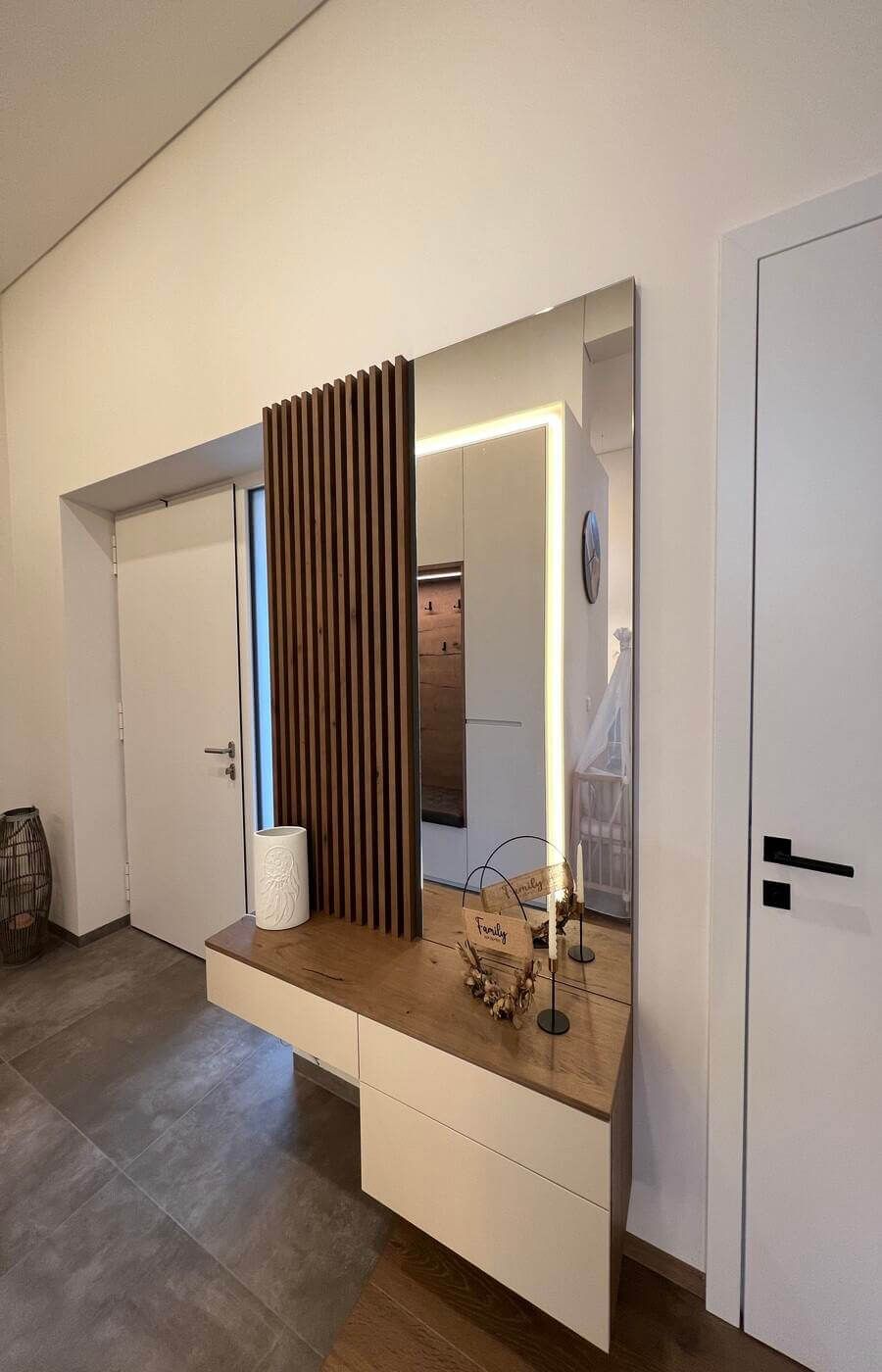 Projekte 23 Eingangsbereich mit einer Kommode